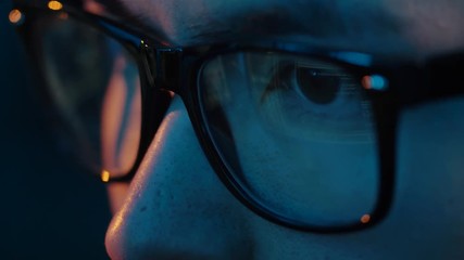 Poster - vision, hacking and technology concept - close up of hacker eyes in glasses looking at computer screen in darkness