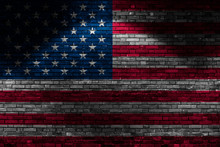 USA Flag On Brick Wall At Night