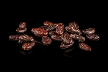 Roasted beans. Cocoa beans and coffee beans isolated on black background.