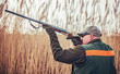 © bobex73 - Hunter with a rifle in hunting