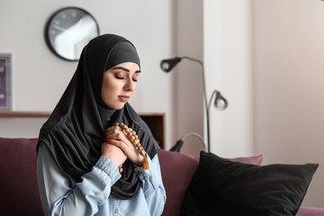 Poster - Muslim woman with tasbih at home