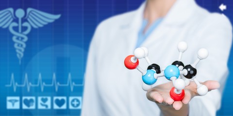 Wall Mural - Close up of Molecular structure model in hand on background