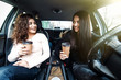 © F8  \ Suport Ukraine - Two young beauty women friends drive car in a road trip