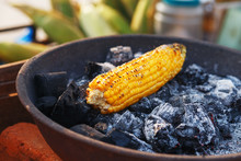 Indian Food On The Beach - Fresh Corn Cobs Are Roasted On The Coals.
