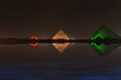 Great Giza pyramids at night, water reflection