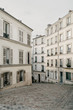 © Julia Volk/Stocksy - empty street of Paris