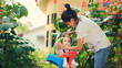 © PixieMe - Baby sitter play with kid