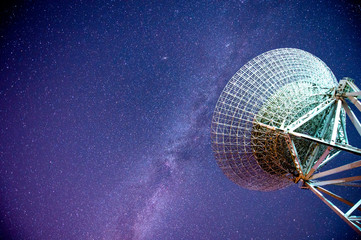 Radio telescopes and the Milky Way at night