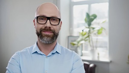 Poster - Bearded middle-aged man wearing glasses