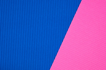 Blue and pink corrugated paper texture, use for background. vivid colour with empty space for add text or object.