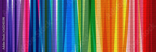 Bandes multicolores sur mur en briques Poster Mural XXL