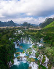 Massive Hidden Waterfall Surrounded By Mountain With Blue Clean Water. Paradise On The Border Between China And Vietnam. Ban Gioc Waterfall, Detian.	
