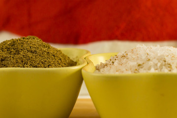 seasonings spicy tasty cumin brown ground in a ceramic bowl salt seasoned with large crystals close-up