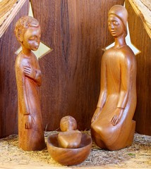 Wall Mural - manger with the Holy Family carved on African style