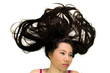 © Nutt - Closeup portrait of happy asian women  lying on ground with black long hair.