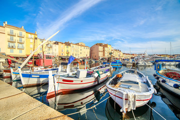 Wall Mural - Boats and luxury yachts in por of Saint Tropez, France