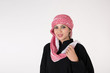 © Mahmoud Rahall - pretty young Arab female in traditional dress posing on white background