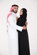 © Mahmoud Rahall - Arab couple standing on white background