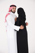 © Mahmoud Rahall - Arab couple standing on white background