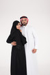 © Mahmoud Rahall - Arab couple standing on white background