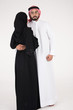 © Mahmoud Rahall - Arab couple standing on white background