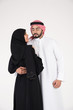 © Mahmoud Rahall - Arab couple standing on white background