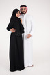 © Mahmoud Rahall - Arab couple standing on white background