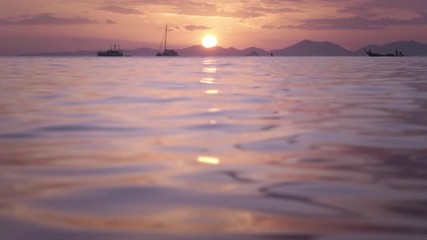 Sticker - slow motion water of tropical sea, bokeh