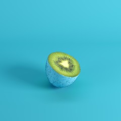 Wall Mural - Half of ripe green kiwi fruit with peel painted in blue isolated on blue background. Minimal fruit idea concept.