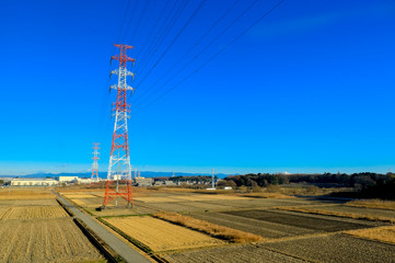 high voltage power supply tower cross along the agriculture,Japan