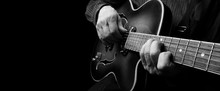 Guitarist Hands And Guitar Close Up. Playing Electric Guitar. Copy Spaces.  Black And White.