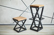 two stylish chairs made of wood and metal