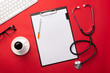 © Dz Lab - Stethoscope in doctors desk with tablet and coffee cup, top view