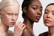 Portrait of three females with different complexion feeling confident