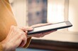 © tetxu - senior woman holding a digital tablet or laptop