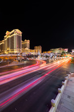 Las Vegas, Nevada / USA - 09.03.2015: Cars At The Junction Of South Las Vegas Boulevard And West Flamingo Road In Front Of Caesars Palace On The Las Vegas Strip At Night.