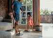 © Odua Images - little girl help her daddy to do chores at home