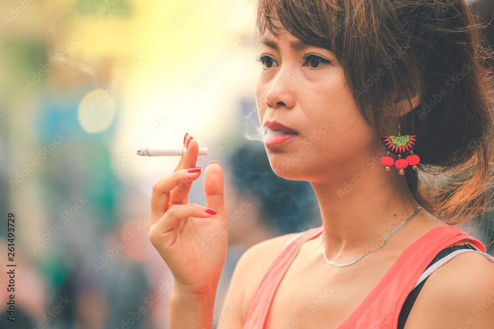 stressed cigarette Stressed asian woman addiction smoking a cigarette in vintage style Stock  Photo
