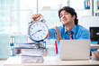 © Elnur - Handsome businessman unhappy with excessive work in the office