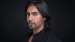 © Roberto Vivancos - Portrait of Indian man with long black hair in studio