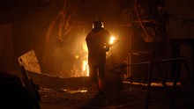 Metallurgist At Work By The Blast Furnance, Iron And Steel Works