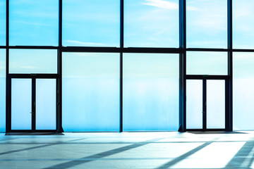 Poster - Spacious room with panoramic windows. Modern office interior. Space for business. Office rental. Frosted windows in the entire wall.