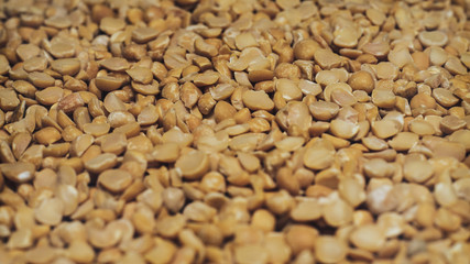 Poster - Сhopped dried peas background. Macro view.