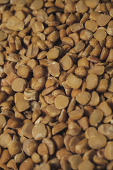 Poster - Сhopped dried peas background. Macro view.