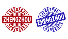 Grunge ZHENGZHOU Round Stamp Seals Isolated On A White Background. Round Seals With Grunge Texture In Red And Blue Colors. Vector Rubber Imprint Of ZHENGZHOU Title Inside Circle Form With Stripes.