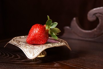 Fresh strawberry on a dark background 