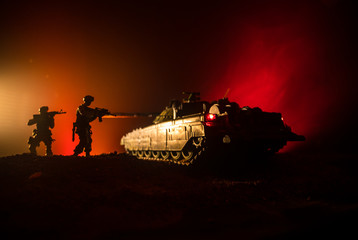 War Concept. Military silhouettes fighting scene on war fog sky background, World War German Tanks Silhouettes Below Cloudy Skyline At night. Attack scene. Armored vehicles. Tanks battle