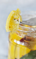 Poster - Preserved lemons with salt. salted canned lemons.  Moroccan cuisine. fermenting