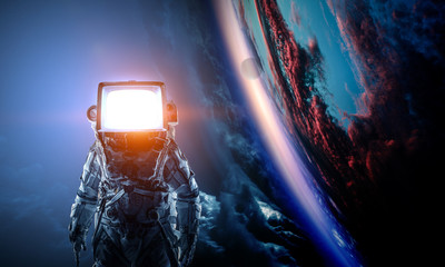 Wall Mural - astronaut with tv head in space. mixed media.