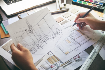 Architect designer Interior creative working hand drawing sketch plan blue print selection material color samples art tools Design Studio